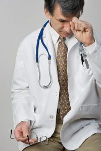 Exhausted, Frustrated Doctor