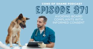 dog looking over paperwork clipboard with veterinarian
